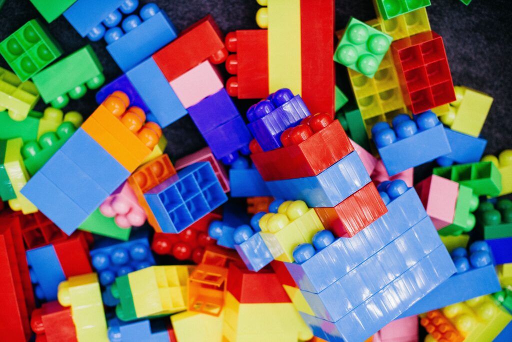 Blue, red, yellow and green plastic building blocks