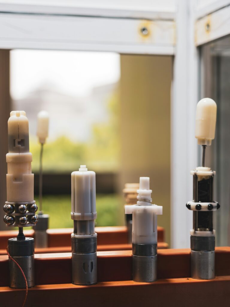 Precision molded engineering plastic components in a mechanical assembly