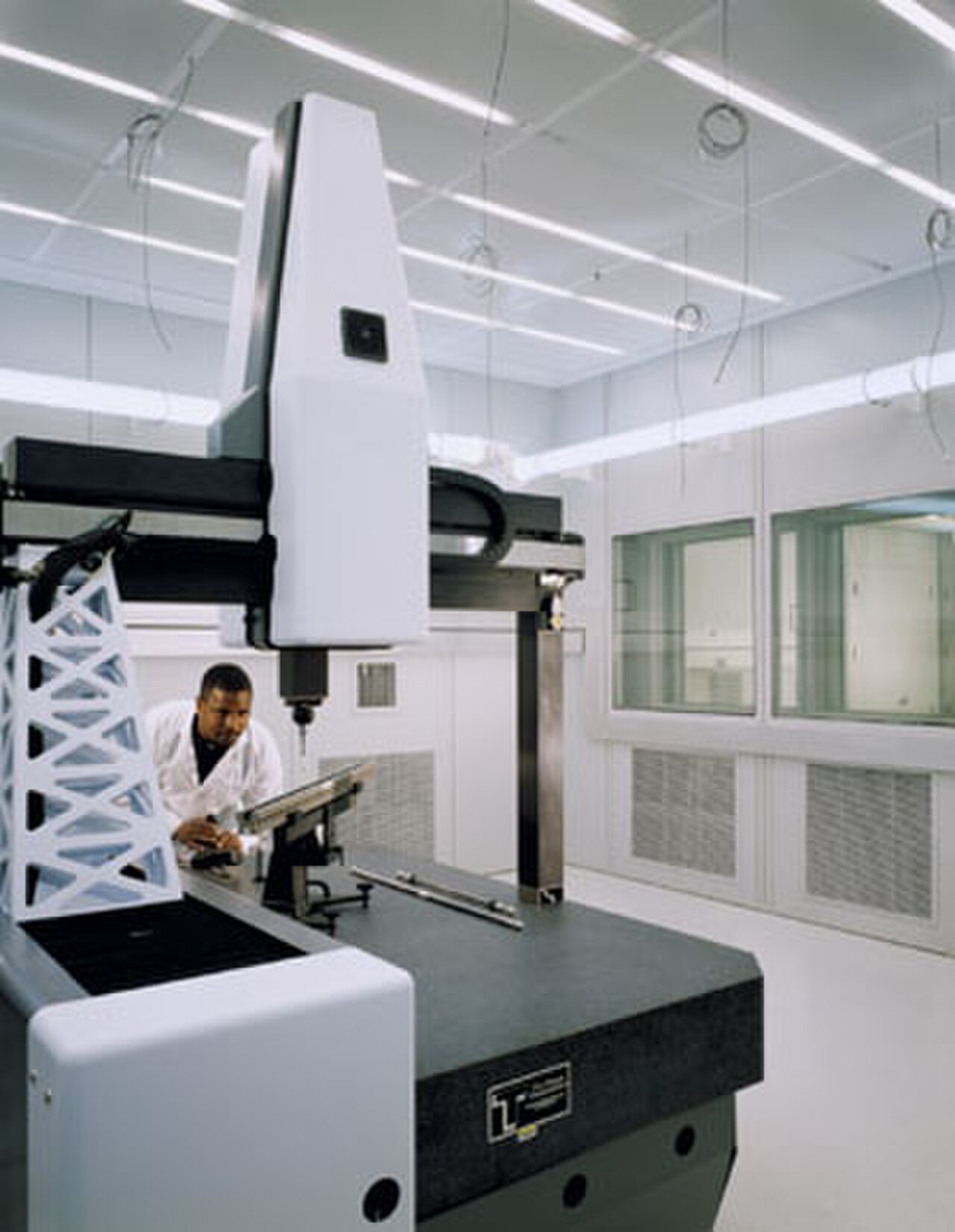 Bridge coordinate measuring machine (CMM) in a metrology lab